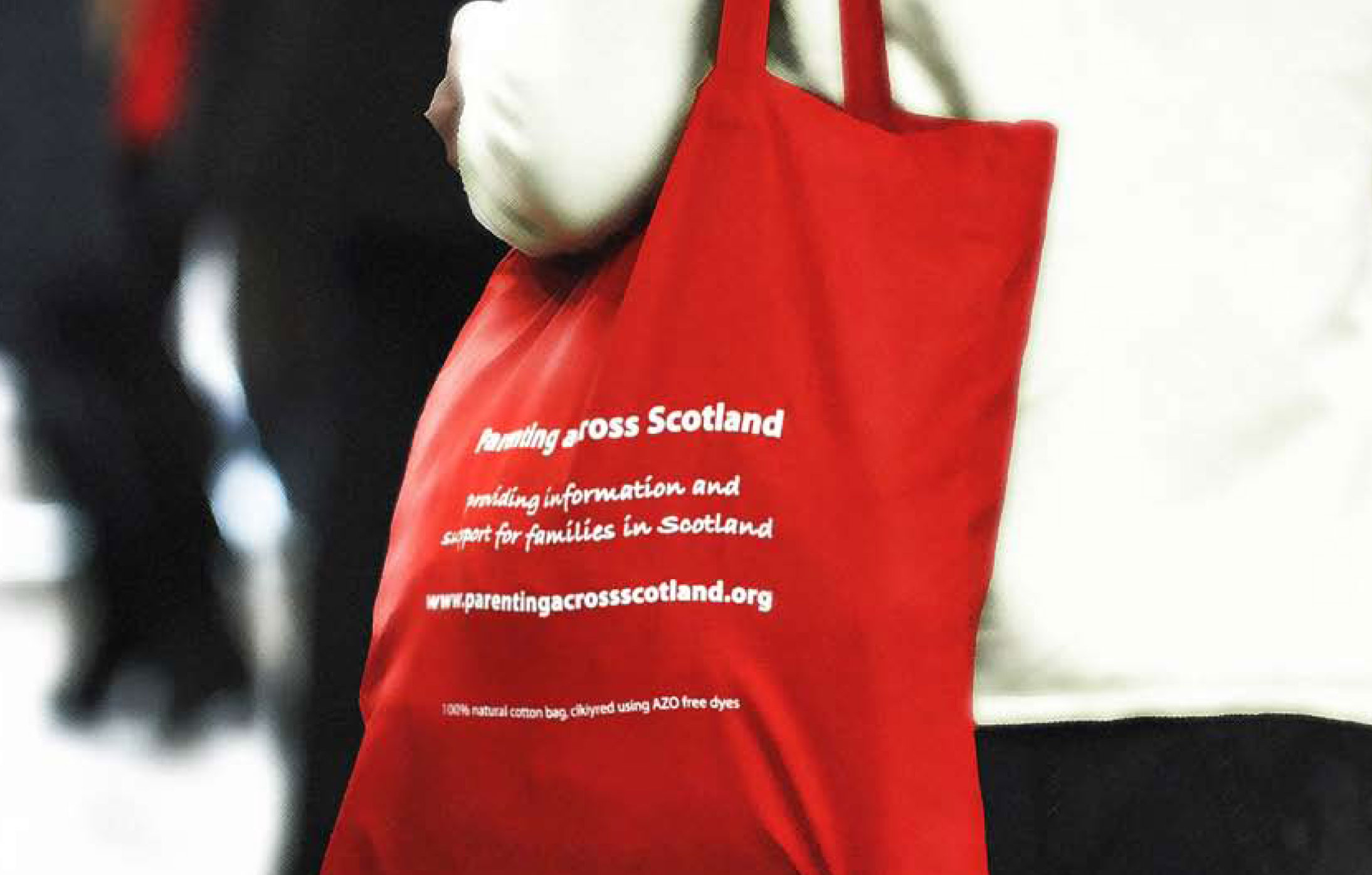 Person carrying PAS conference bag