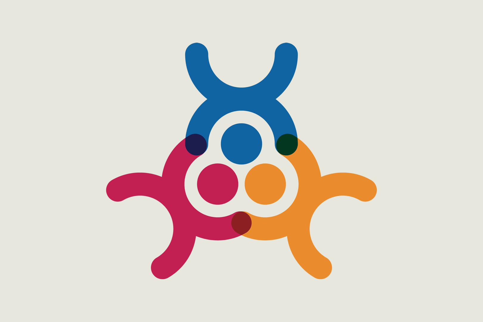 Three figure icons with heads together working